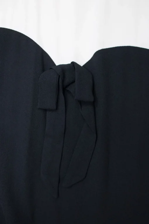 Black and ivory long-sleeved knee length dress with ribbon