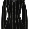 Black and ivory wool-blend intarsia knit crewneck peplum long sleeve top