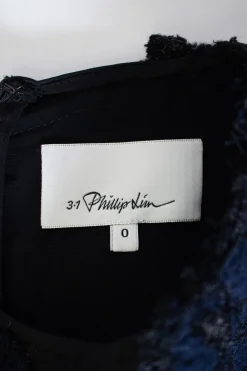 Black and navy cotton-nylon blend mixed media belted mini shift with bonded lace