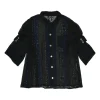 Black and navy paneled guipure lace swing-style short sleeve shirt with tab cuff sleeves