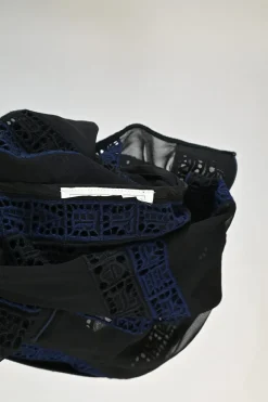 Black and navy paneled guipure lace swing-style short sleeve shirt with tab cuff sleeves