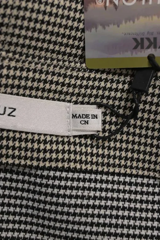 Black and neutral paneled polyester-blend micro houndstooth tweed pencil skirt