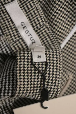 Black and neutral paneled polyester-blend micro houndstooth tweed pencil skirt