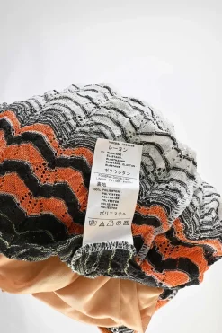 Black and orange polyester-blend scoop neck warp knit pointelle pullover shift dress with flounce hem