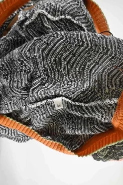 Black and orange polyester-blend scoop neck warp knit pointelle pullover shift dress with flounce hem