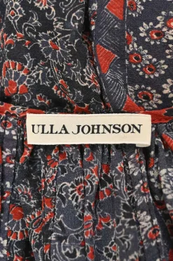 Black and red silk floral print lace-up swing-style tunic top with blouson sleeves