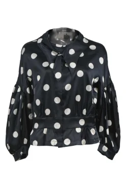 Black and white polka dot polyester satin peak collar blouse with drop shoulders and balloon sleeves