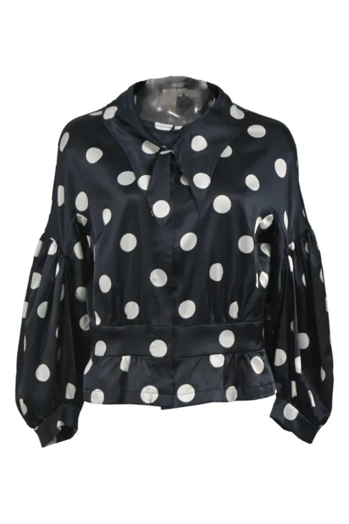 Black and white polka dot polyester satin peak collar blouse with drop shoulders and balloon sleeves
