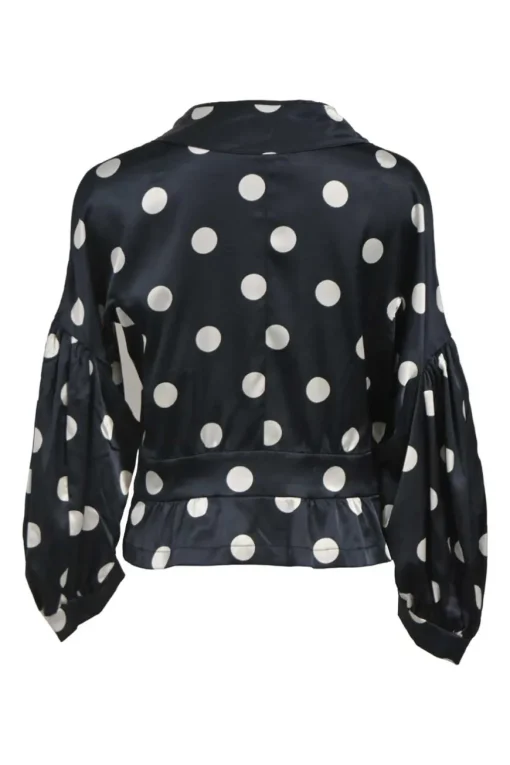 Black and white polka dot polyester satin peak collar blouse with drop shoulders and balloon sleeves