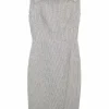 Black and white wool-blend houndstooth boat neck pleated sheath dress