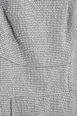 Black and white wool-blend houndstooth boat neck pleated sheath dress