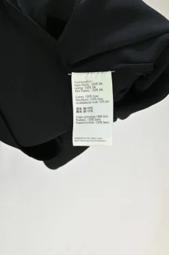Black beaded silk raglan sleeve shift dress with vented high-low hem
