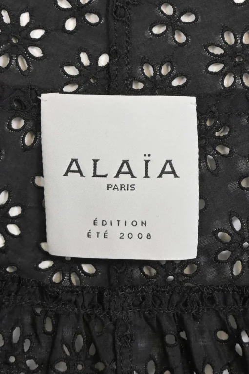 Black bias-cut cotton broderie Anglaise knee-length A-line skirt
