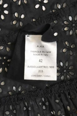 Black bias-cut cotton broderie Anglaise knee-length A-line skirt