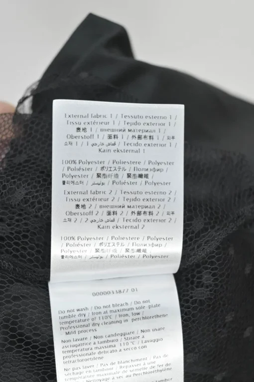 Black bow-embellished polyester plumetis tulle pussy-bow puff sleeve blouse with built-in solid camisole