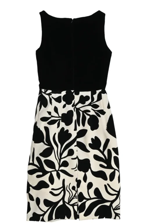 Black brooch-embellished two-tone paneled rayon-blend floral Dobby bateau neck sleeveless sheath dress