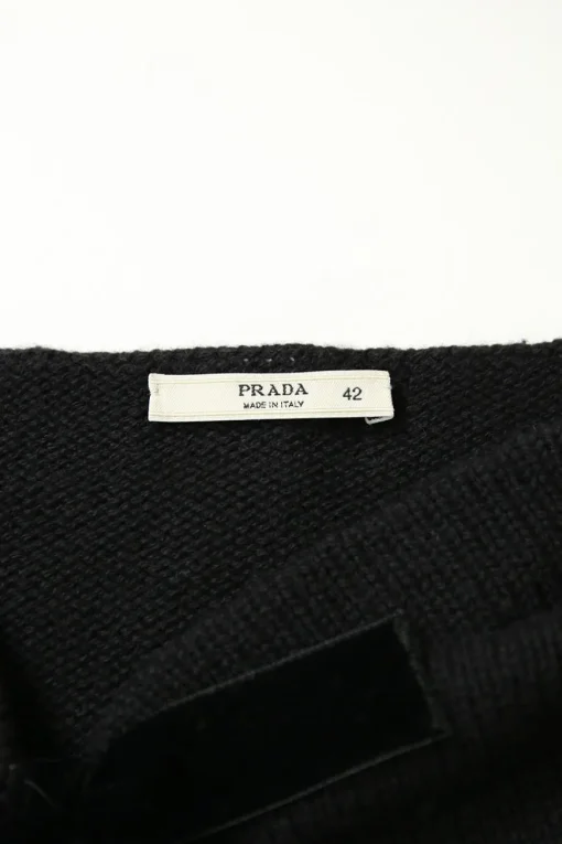 Black cashmere knit bateau neck pullover sweater with tonal velvet bow
