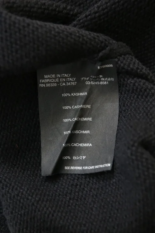 Black cashmere knit bateau neck pullover sweater with tonal velvet bow