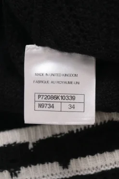 Black cashmere-blend pointelle button-front cardigan with Coco Mark shank buttons