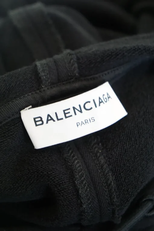 Black cotton French terry small logo hoodie with kangaroo pocket, ribbed cuffs, and hem
