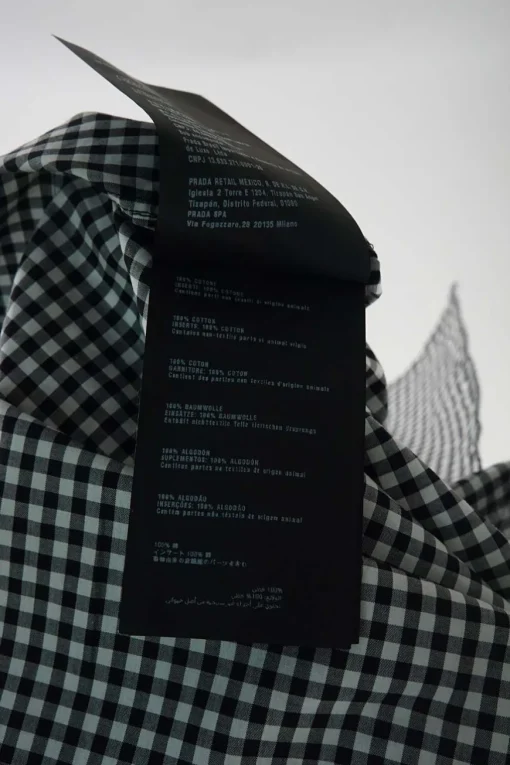 Black cotton gingham boxy shirt dress with ruffle-trimmed concealed placket