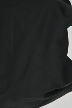 Black cotton jersey crewneck pullover swing-style T-shirt with faux leather lace-up side seams