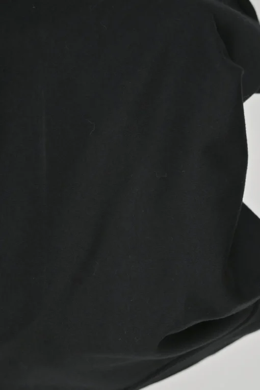 Black cotton jersey crewneck pullover swing-style T-shirt with faux leather lace-up side seams