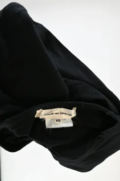 Black cotton jersey long sleeve crewneck pullover top with self floral sleeve appliqué