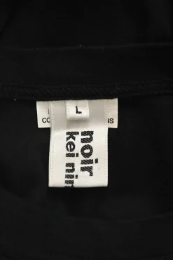 Black cotton mixed-media pullover peek-a-boo T-shirt with semi-sheer polyester ribbon-tie bishop sleeves