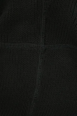 Black cotton paneled jersey knit drop-waist bustier mini dress with woven poplin ruffle skirt