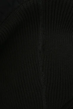 Black cotton paneled jersey knit drop-waist bustier mini dress with woven poplin ruffle skirt
