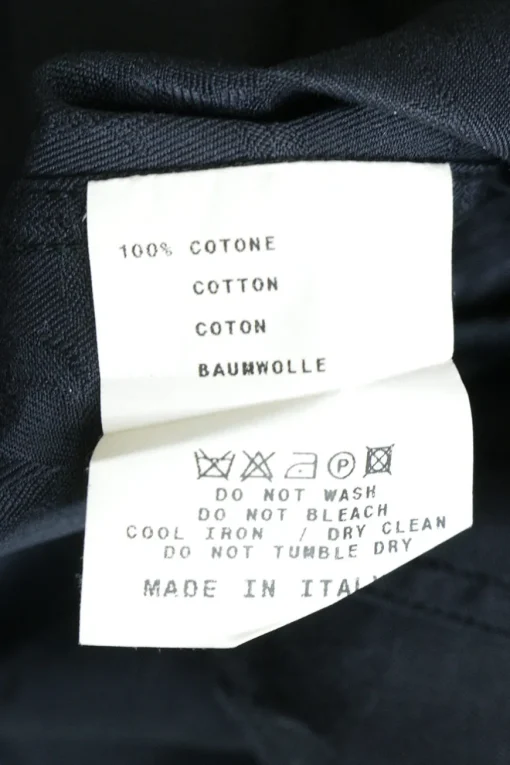 Black cotton poplin jabot collar button-front shirt with flounce button cuffs