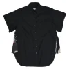 Black cotton poplin point collar dolman short sleeve button-front swing shirt with printed side inserts