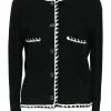 Black cotton raschel knit collarless button-front cardigan jacket with contrasting braided edges and Coco Mark shank buttons