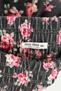 Black cotton twill rose print pull-on high-rise mini skirt with elasticated waistband