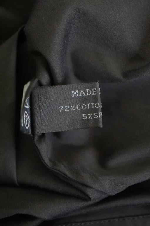 Black cotton-blend poplin button-front shirt with chest patch pocket and curved hem