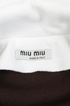 Black cotton-blend two-tone half-zip spread notch collar polo with logo chest patch