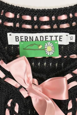 Black cotton-linen ajour knit Lotta cardigan with pink satin ribbons and lace-up trim