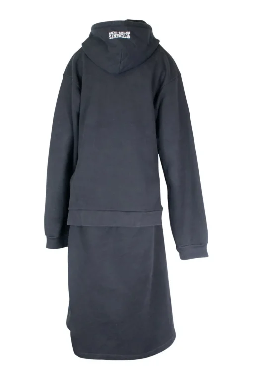 Black cotton-poly blend oversized hoodie with hood embroidery.