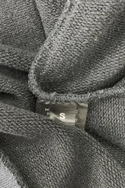 Black cotton-poly blend oversized hoodie with hood embroidery.