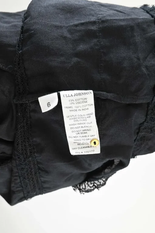 Black cotton-viscose blend pullover puff sleeve blouse with tonal lace inserts and keyhole back