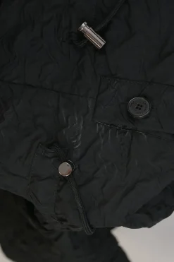 Black crinkle polyester-blend band collar half-button pullover cap sleeve mini A-line dress with toggle waist