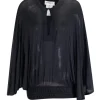 Black dolman sleeve top with ruched hem and drawstring embellished with wooden beads