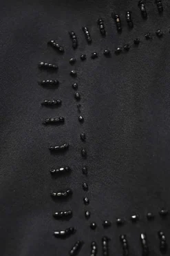 Black draped embellished silk dolman sleeve peplum blouse featuring tonal bead broderie motif