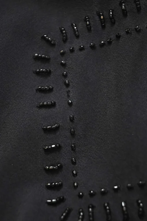 Black draped embellished silk dolman sleeve peplum blouse featuring tonal bead broderie motif