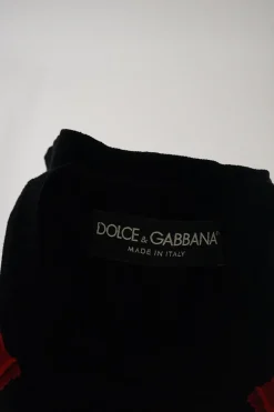 Black embroidered silk sleeveless crewneck pullover knit top featuring rose motif
