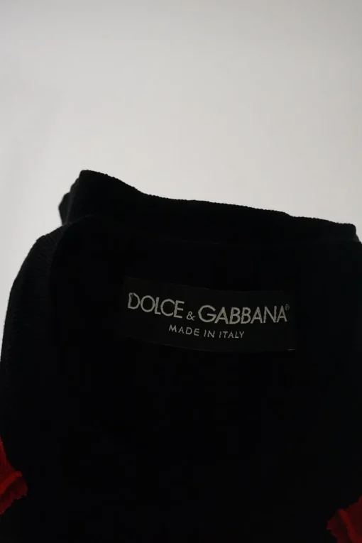 Black embroidered silk sleeveless crewneck pullover knit top featuring rose motif