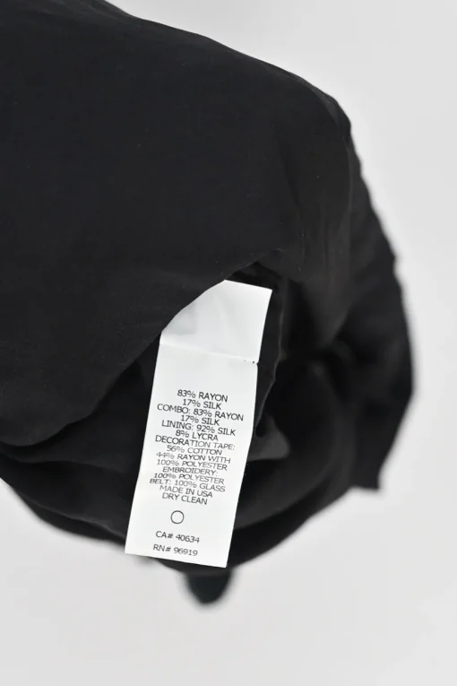 Black mixed-media embellished rayon-blend wrap sheath dress with studded tie-waist fastening
