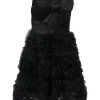 Black nylon mixed-media strapless cocktail dress with draped bow bodice and ra-ra style gathered tulle skirt