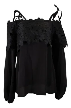 Black off-shoulder top with black flower applique chest flap